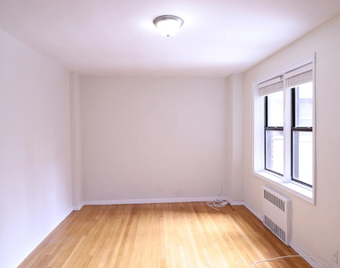 98-30 67th Avenue - Photo Thumbnail 4