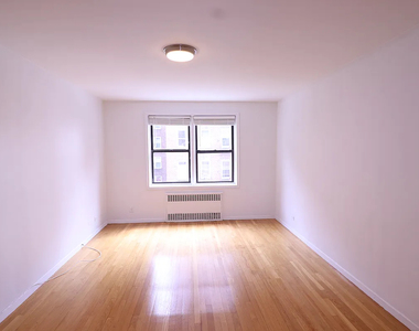 98-30 67th Avenue - Photo Thumbnail 1