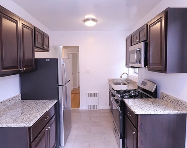 98-30 67th Avenue - Photo Thumbnail 7