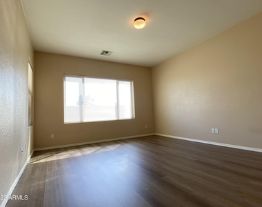517 S 115th Drive - Photo Thumbnail 14