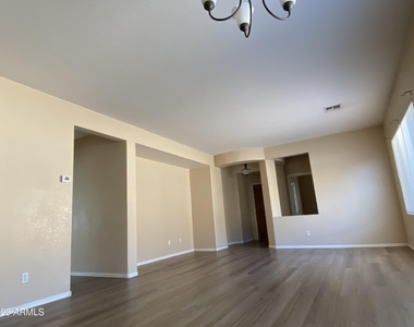 517 S 115th Drive - Photo Thumbnail 1