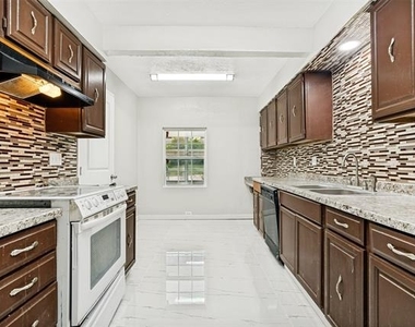 8805 N Normandale Street - Photo Thumbnail 13