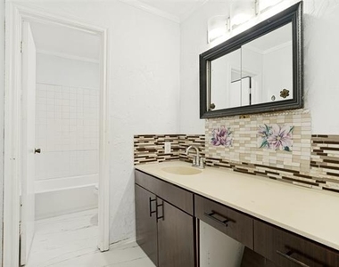 8805 N Normandale Street - Photo Thumbnail 17