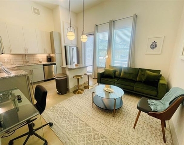 13701 Montfort Drive - Photo Thumbnail 2