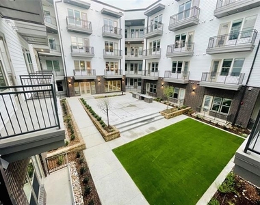 13701 Montfort Drive - Photo Thumbnail 4