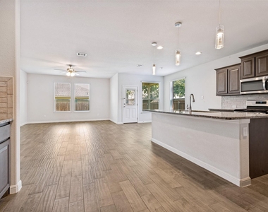 9112 Sycamore Leaf Drive - Photo Thumbnail 2