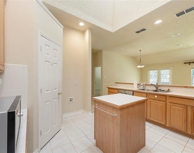 9906 Madison Drive - Photo Thumbnail 8