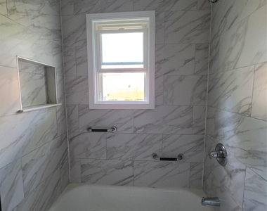 11 White Plains Avenue - Photo Thumbnail 9