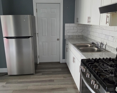 11 White Plains Avenue - Photo Thumbnail 2