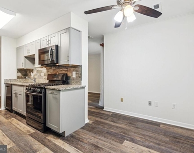 3326 Woodburn Village Drive - Photo Thumbnail 3