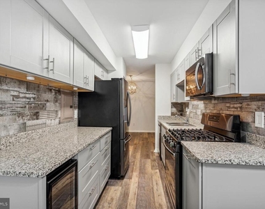 3326 Woodburn Village Drive - Photo Thumbnail 1