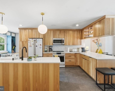 5902 Wilson Lane - Photo Thumbnail 7