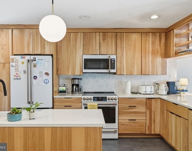 5902 Wilson Lane - Photo Thumbnail 8