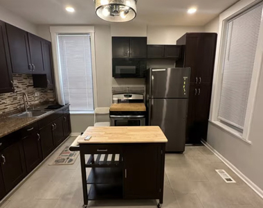 1649 W Garfield Boulevard - Photo Thumbnail 2