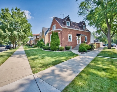 5974 W Miami Avenue - Photo Thumbnail 1