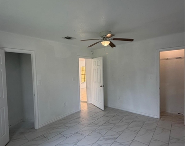 9210 Tacquard Drive - Photo Thumbnail 5