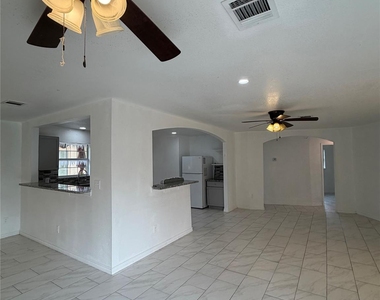 9210 Tacquard Drive - Photo Thumbnail 1