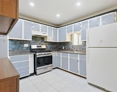 8169 Garland Street - Photo Thumbnail 6