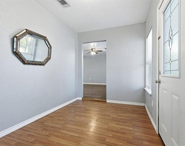 8169 Garland Street - Photo Thumbnail 3