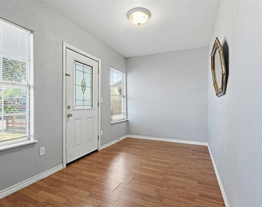 8169 Garland Street - Photo Thumbnail 2