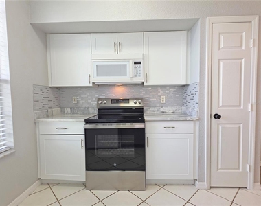 9018 Lake Chase Island Way - Photo Thumbnail 10