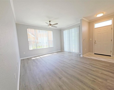 9018 Lake Chase Island Way - Photo Thumbnail 3
