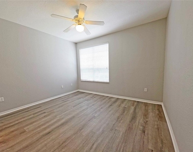 9018 Lake Chase Island Way - Photo Thumbnail 13