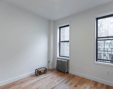 East 36th  Street - Photo Thumbnail 4