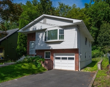65 Wetmore Ave - Photo Thumbnail 1