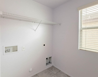 5216 W Albeniz Place - Photo Thumbnail 18