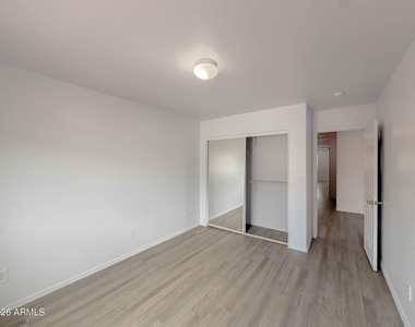 5216 W Albeniz Place - Photo Thumbnail 14