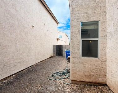 5216 W Albeniz Place - Photo Thumbnail 25