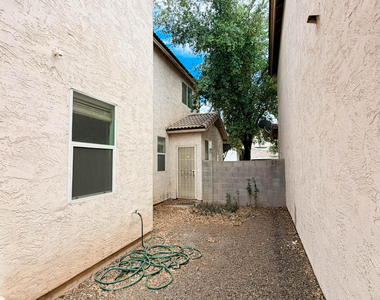5216 W Albeniz Place - Photo Thumbnail 26
