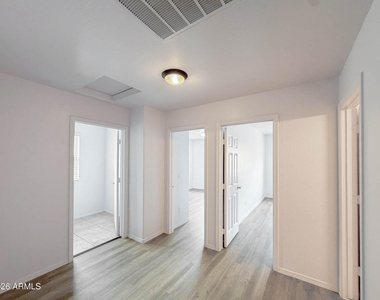 5216 W Albeniz Place - Photo Thumbnail 15