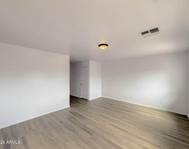 5216 W Albeniz Place - Photo Thumbnail 9