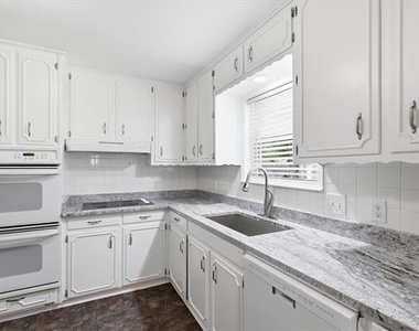 302 W 4th Street - Photo Thumbnail 13