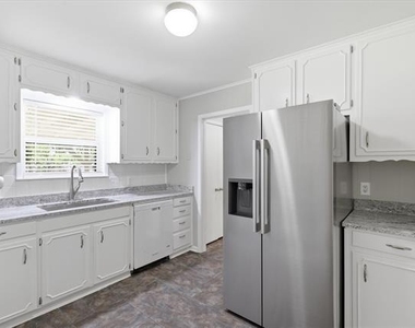 302 W 4th Street - Photo Thumbnail 10