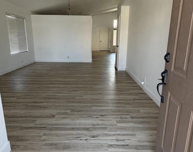 1933 E Tyson Place - Photo Thumbnail 2