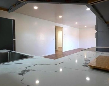 8836 Valencia St - Photo Thumbnail 13