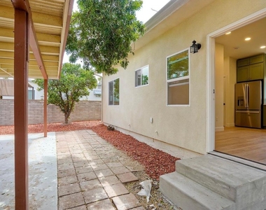6942 Eberhart St - Photo Thumbnail 2