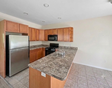 61 N River Drive - Photo Thumbnail 5