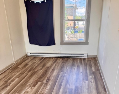 114 W Martin Street - Photo Thumbnail 4