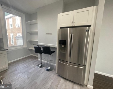 709 W Girard Avenue - Photo Thumbnail 6