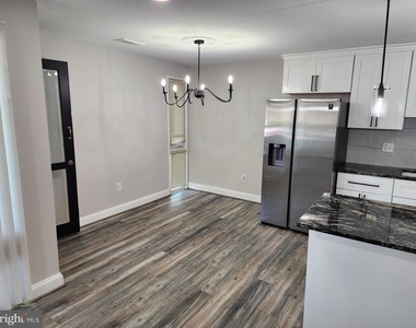 7328 Donnell Place - Photo Thumbnail 3