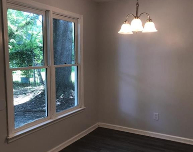 6233 Rhemish Drive - Photo Thumbnail 2
