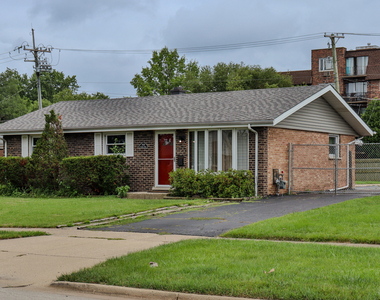 7119 Stanford Drive - Photo Thumbnail 1