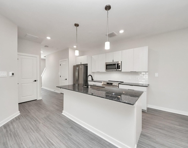 7711 Longmire Road - Photo Thumbnail 10