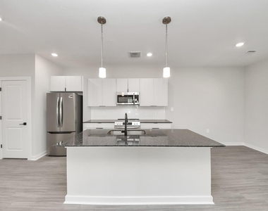 7711 Longmire Road - Photo Thumbnail 1