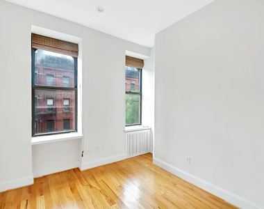 358 West 45th Street - Photo Thumbnail 3