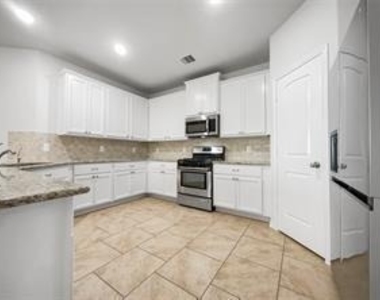4514 Mondial Drive - Photo Thumbnail 2